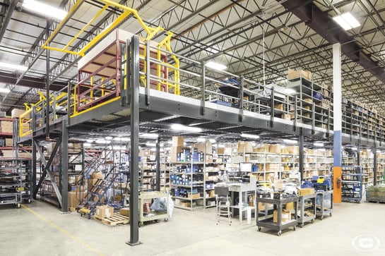 A parts inventory mezzanine seen from below